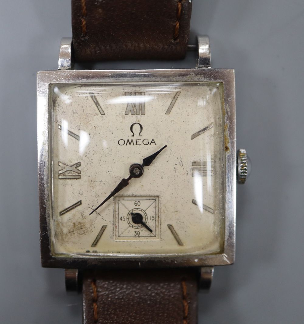 A gentlemans early 1940s stainless steel Omega manual wind square dial wrist watch